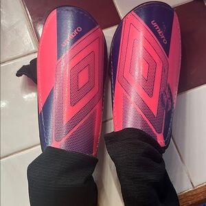 Kids soccer shin guards. Umbro Hot Pink and Navy